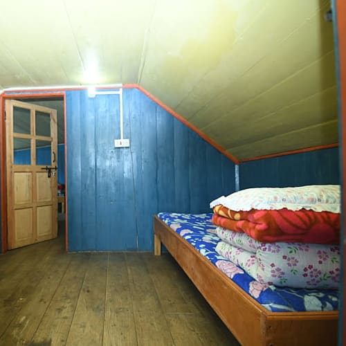 SRK440 Hill facing economy hut in Srikhola