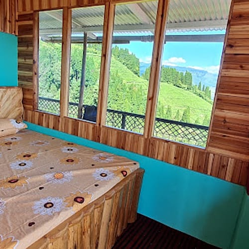 GTE214 A shaped tea garden facing cottage homestay in Gopaldhara 
